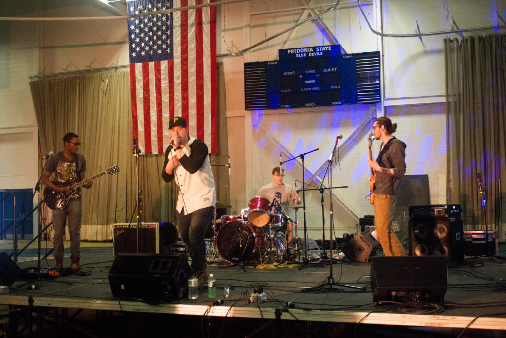 ĆE JJR performs at Life is Art in the Steele Hall Fieldhouse (left to right Jabari Noel, Cam Orlando, Jake McCoy, and Ryan Gese)